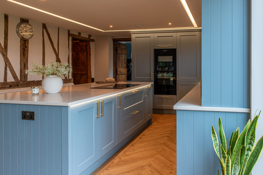 Modern Stori Collection kitchen with blue cabinetry and wood