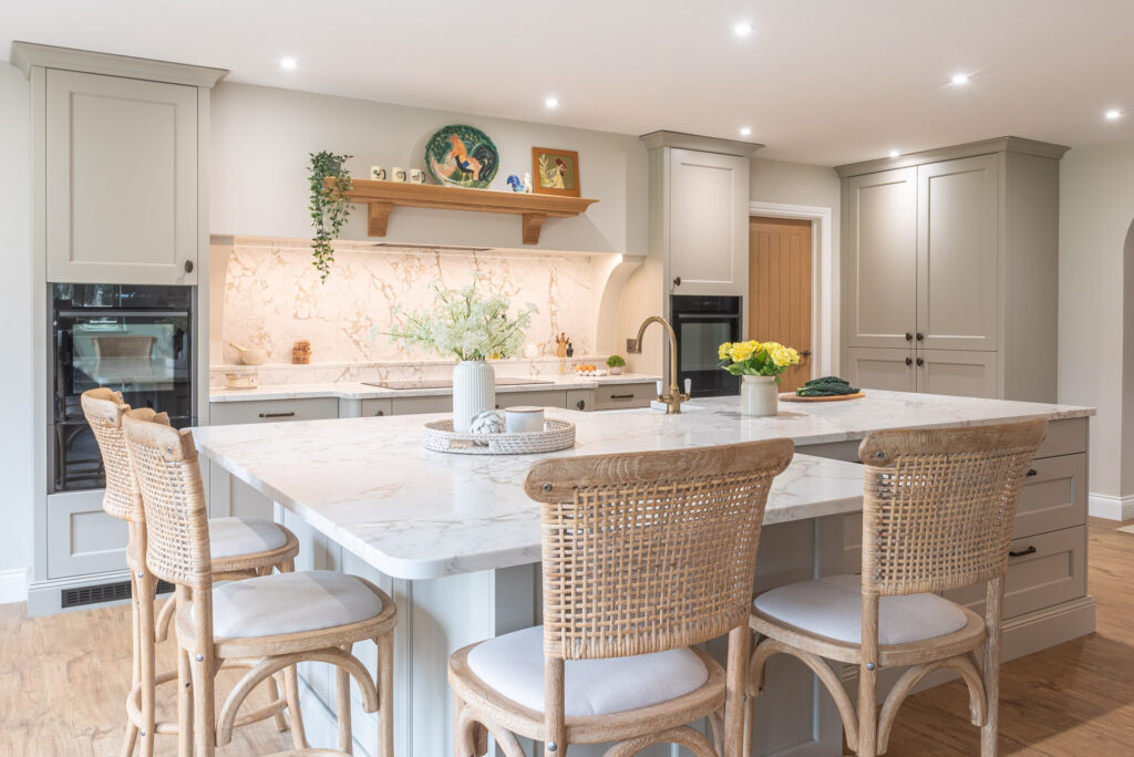 Modern kitchen with marble island from Kitchencraft Design Studio with a Chelmsford Kitchen showroom